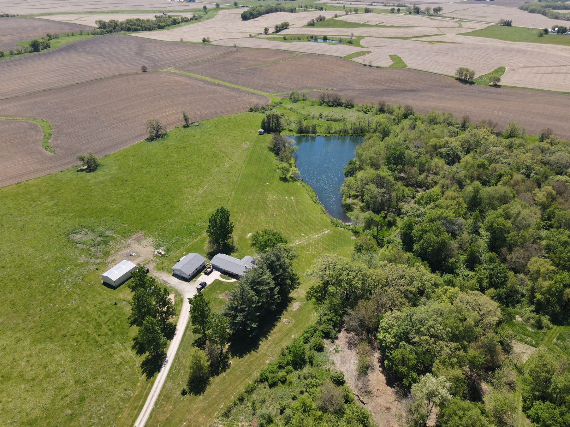 Aerial view of the Verona Fields meadow and estate in Tipton, Iowa